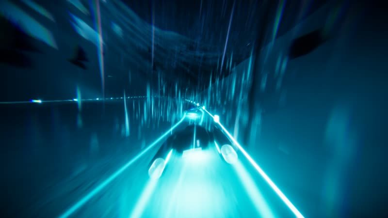 Racer on a floodlit snow slope among dark pines